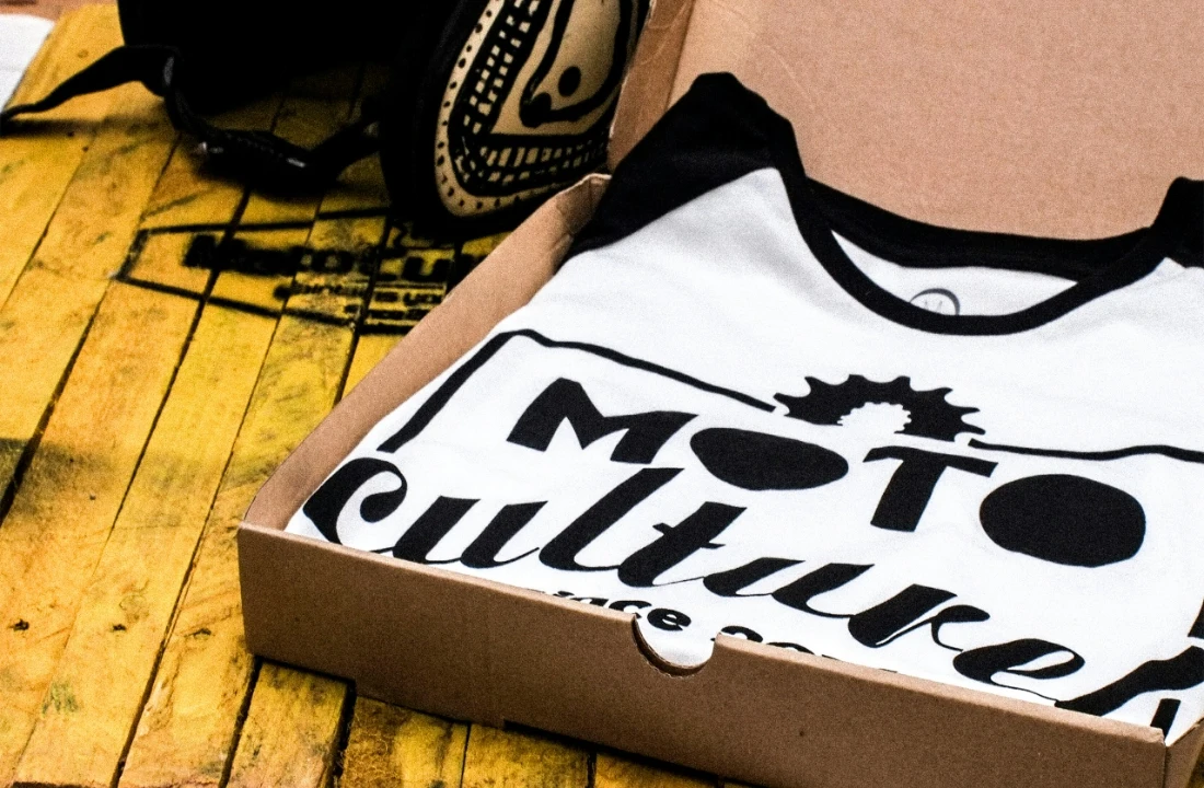 Packaging and clothing labels for retail presentation, suitable for discussing branded unboxing, custom packaging, and scaling custom football shirts