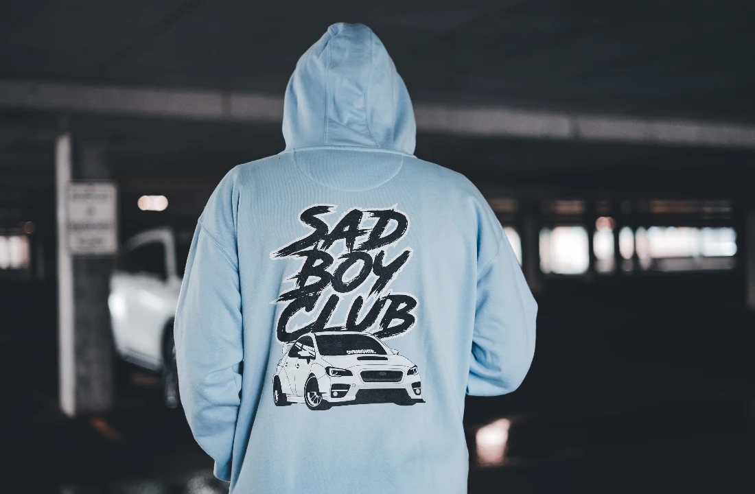 Back view of a light blue graphic hoodie with an automotive design for a POD streetwear collection
