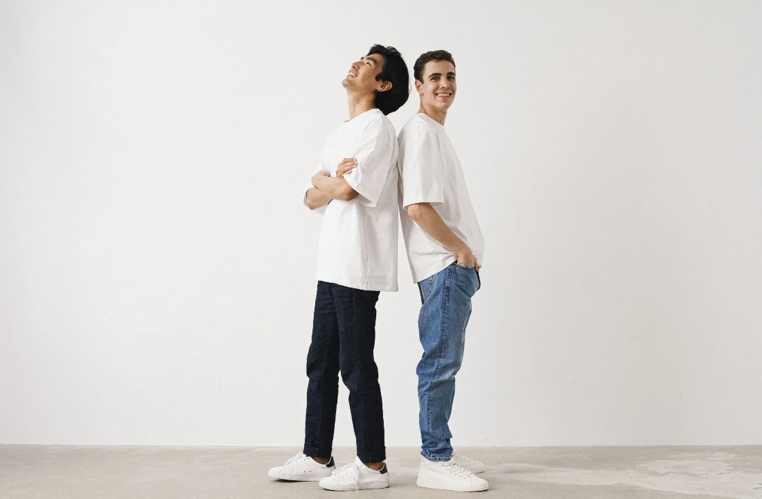 Two models wearing white best t shirt blanks samples to show unisex fit and simple styling