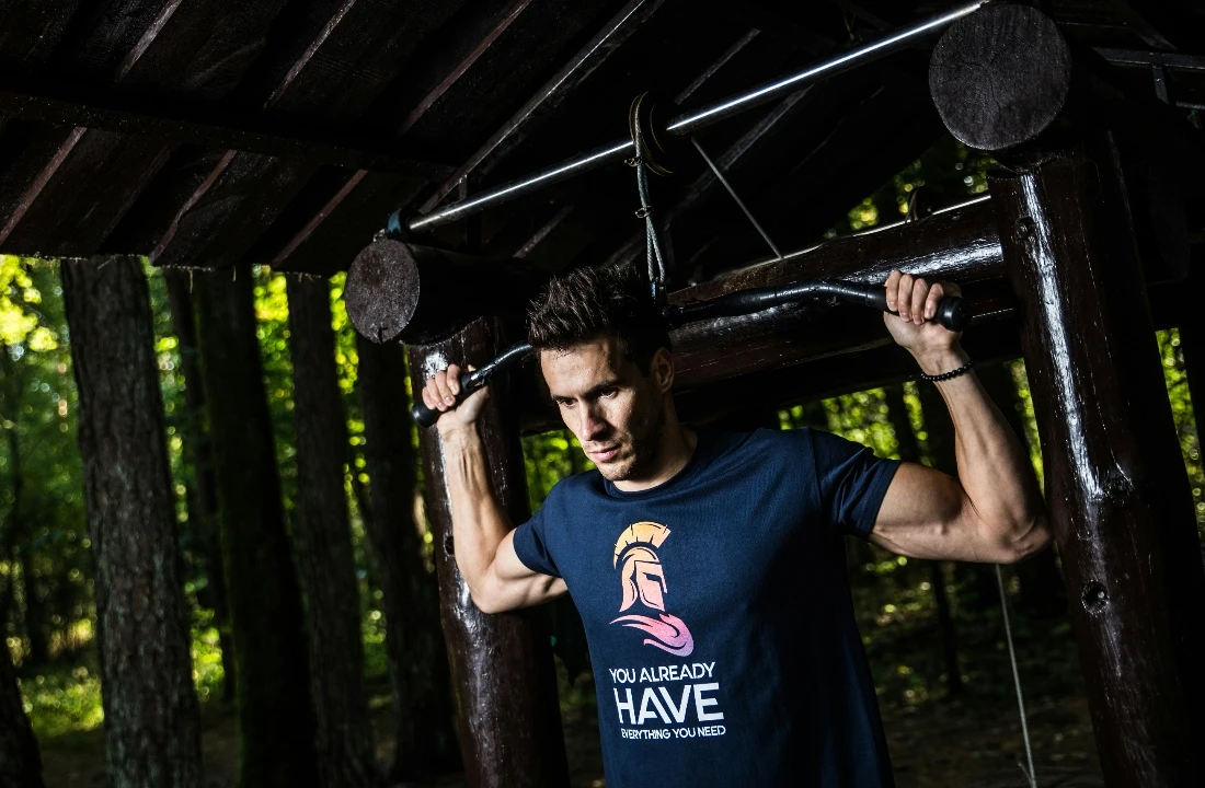 Man wearing a navy Heavyweight T Shirts style during outdoor training, showing durable fabric and athletic fit