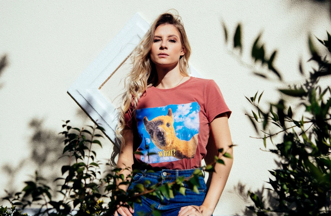 Model wearing a printed graphic T-shirt, showing how a print on demand supplier can support custom apparel visuals for fashion brands