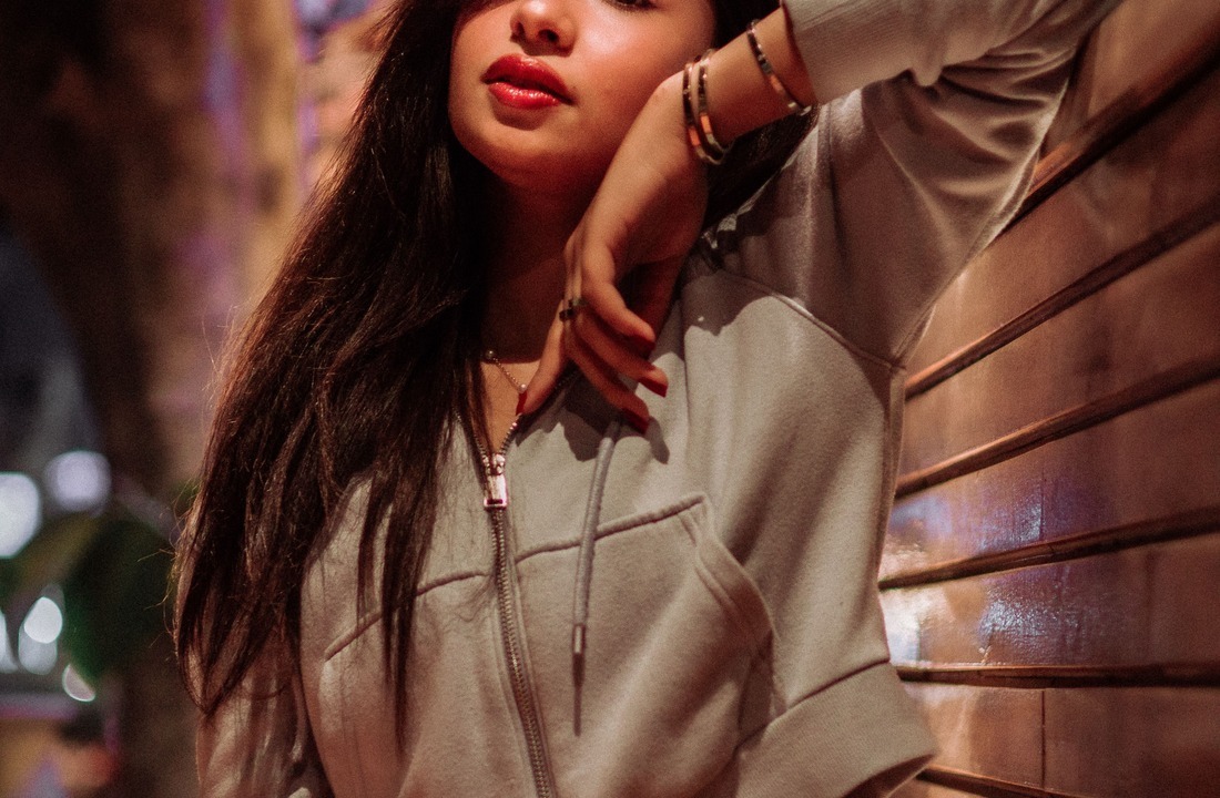 Zip-up hoodie showing front construction and streetwear fit