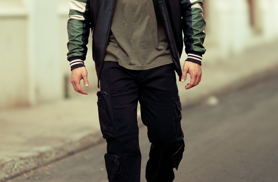 Black cargo streetwear pants showing utility pocket structure