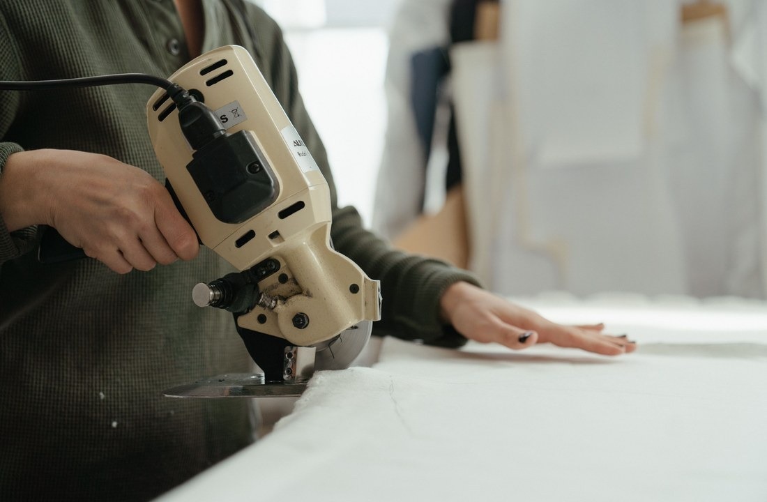 Industrial fabric cutting used to assess custom apparel supplier capability