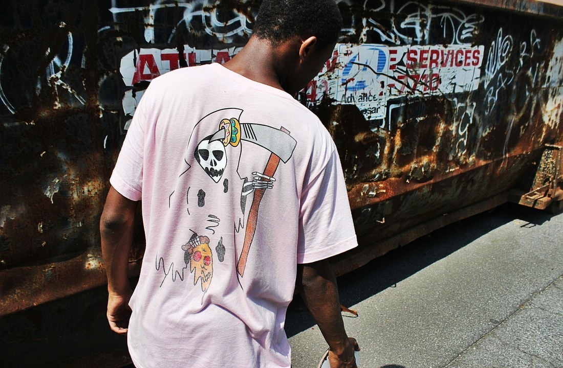 Printed streetwear T-shirt showing a custom apparel pricing variable