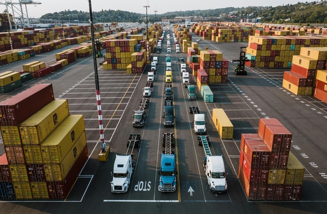 Container terminal illustrating logistics in custom apparel landed cost