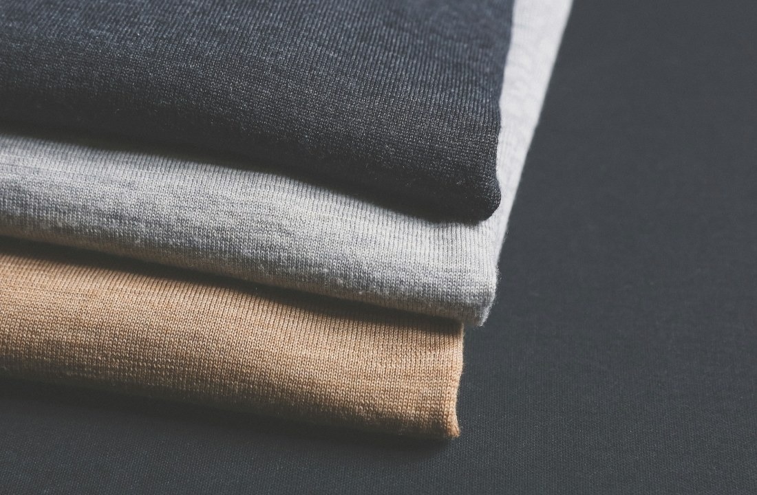Folded knit fabrics in different neutral colors