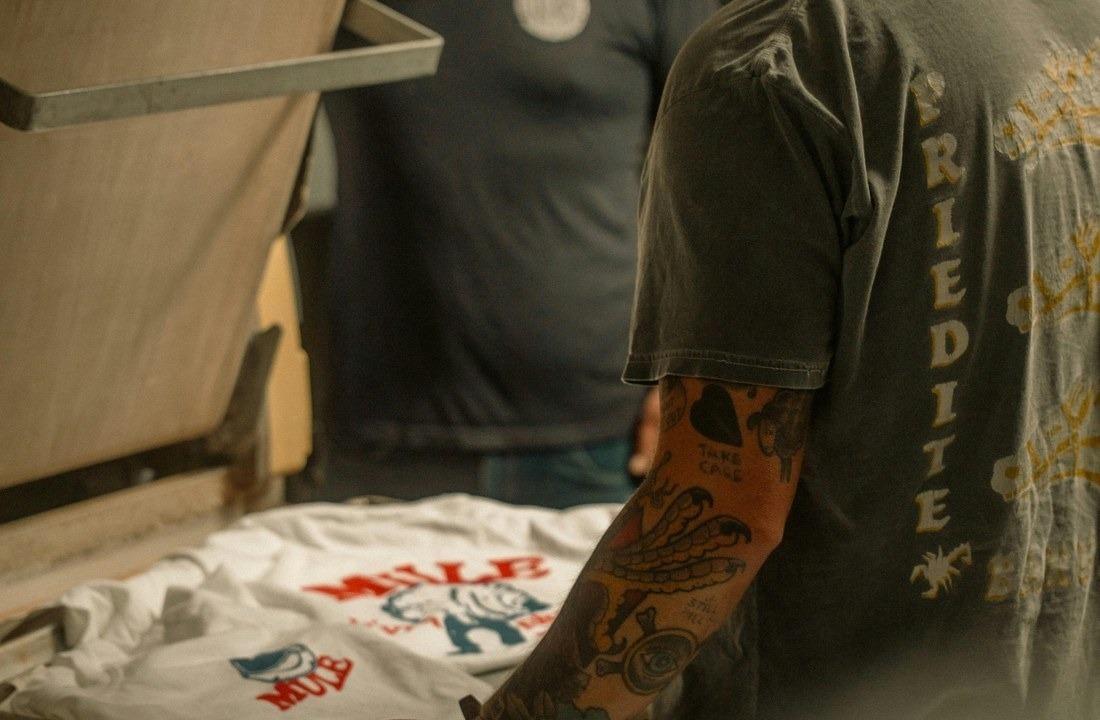 Garment decoration work at a heat press