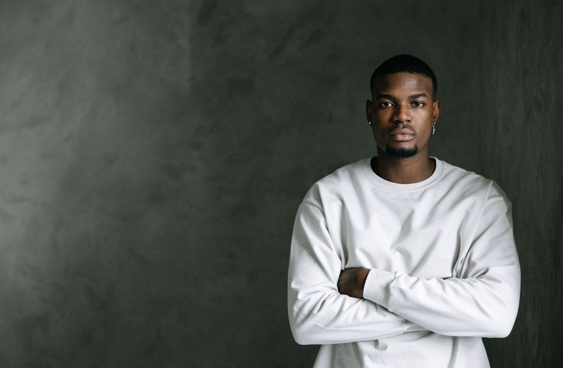 White long-sleeve crew-neck shirt shown from the front