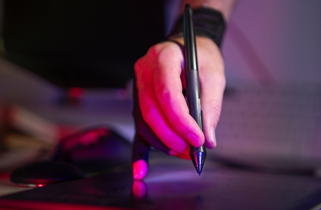 Digital artist preparing artwork with a stylus