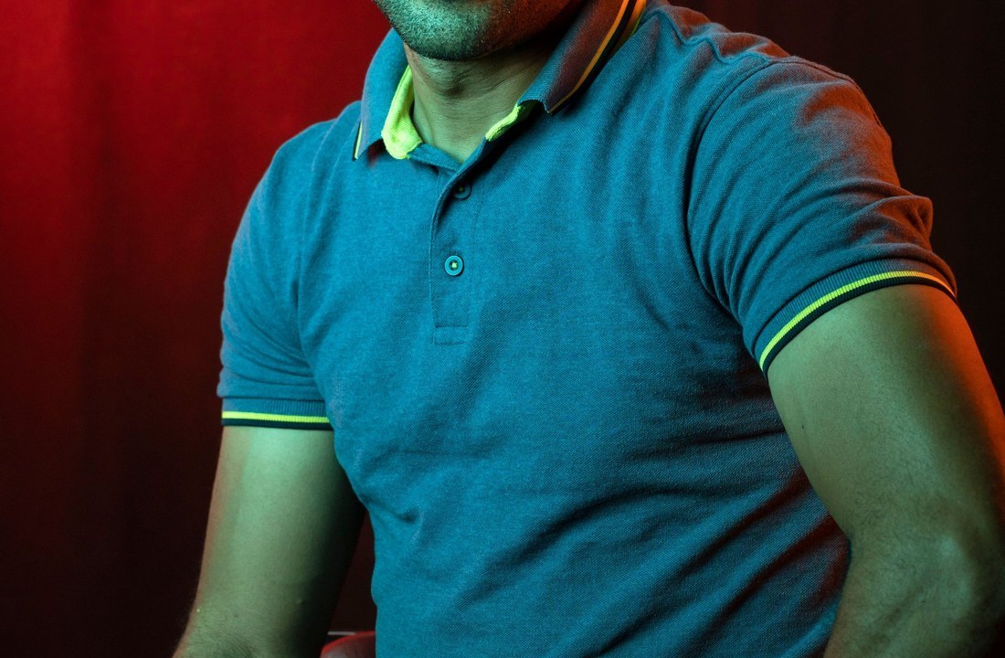 Blue polo shirt fit and collar seen on a model